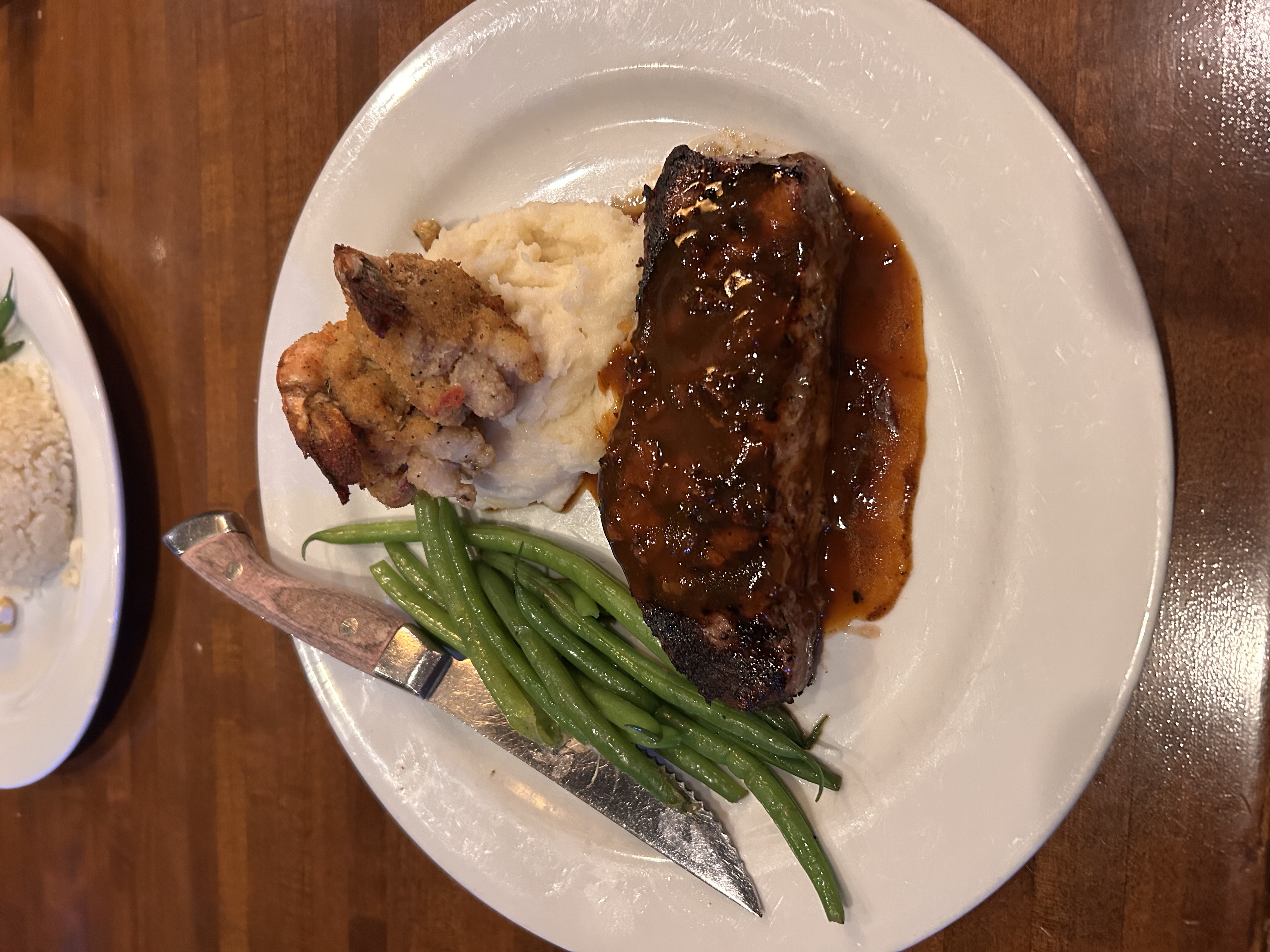 NY Brick Steak & Crab-Stuffed Shrimp at Frankie Bones Restaurant & Lounge